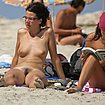 nudist woman with pierced nipple