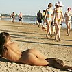 exhibitionist nudist girls playing in the beach