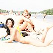 exhibitionist nudist girls playing in the beach