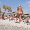 top comes off young teen at beach