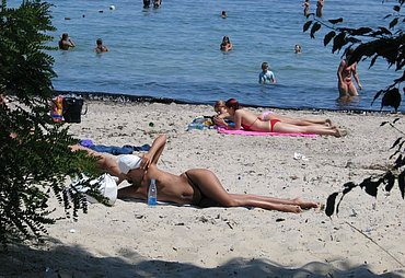 nudisten family at the beach